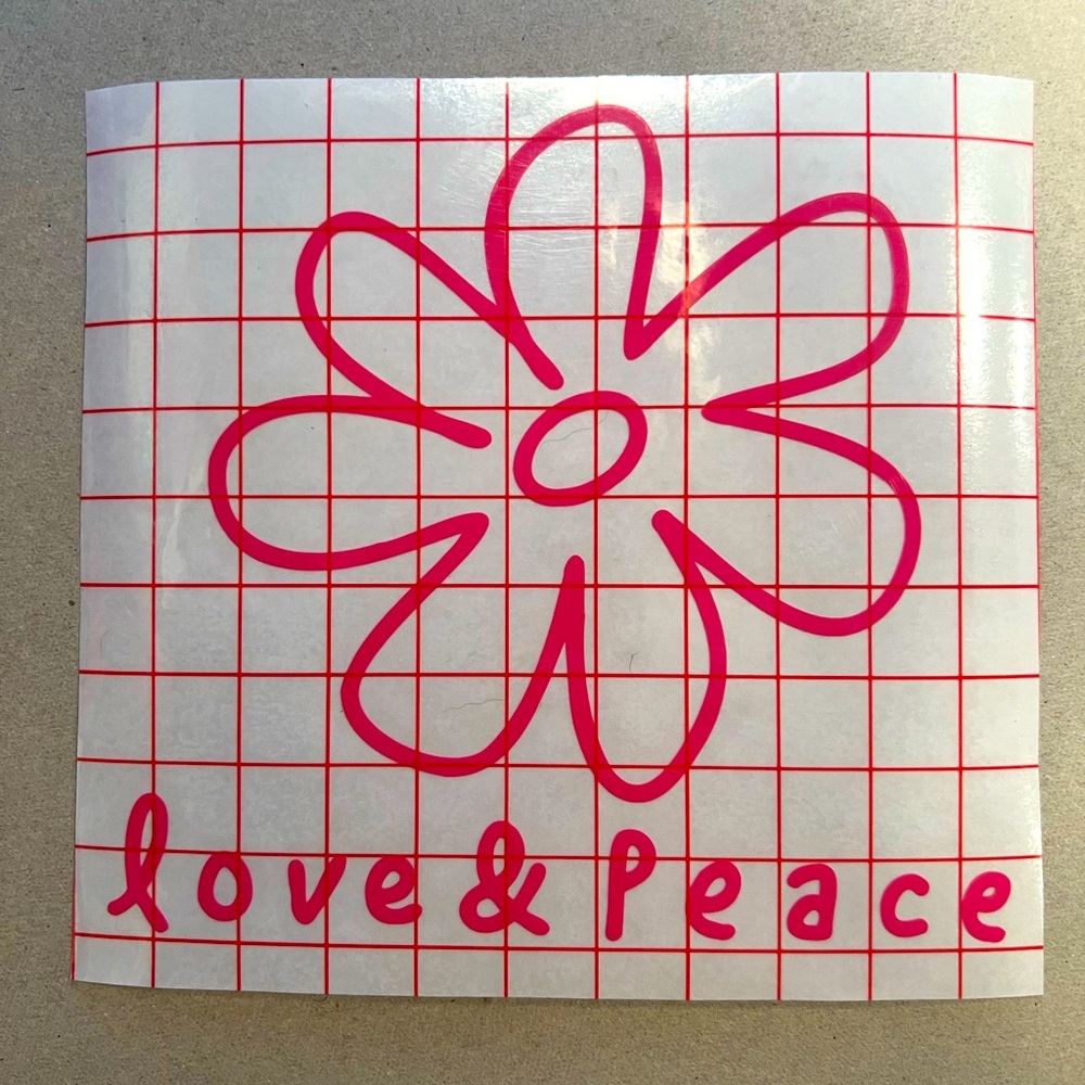 Love & peace vinyl typically used for car windows or tumblers